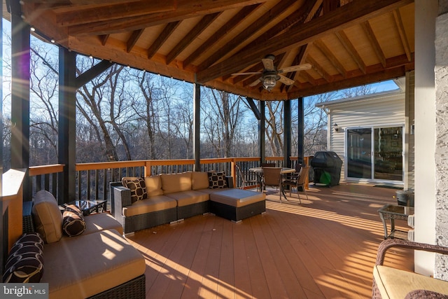 deck featuring area for grilling, an outdoor hangout area, outdoor dining area, and ceiling fan