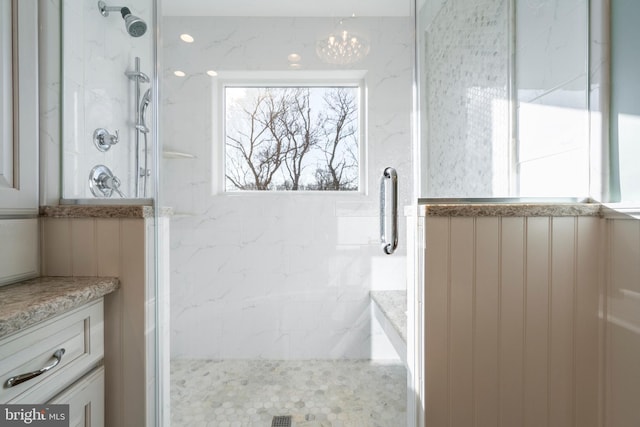 bathroom featuring a shower stall