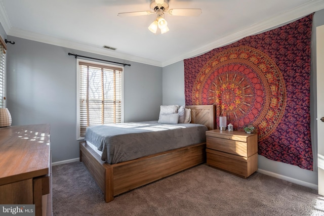 bedroom with visible vents, crown molding, and carpet floors