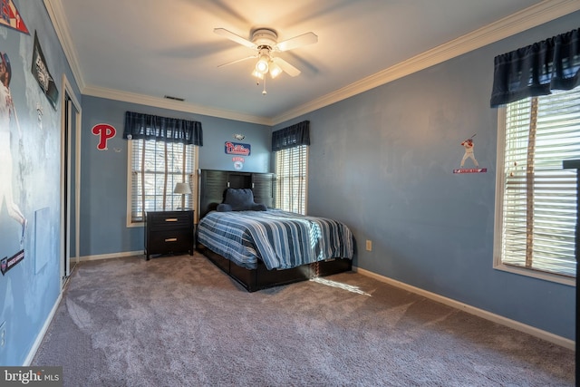 unfurnished bedroom with crown molding, multiple windows, and carpet floors