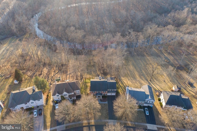 birds eye view of property with a residential view