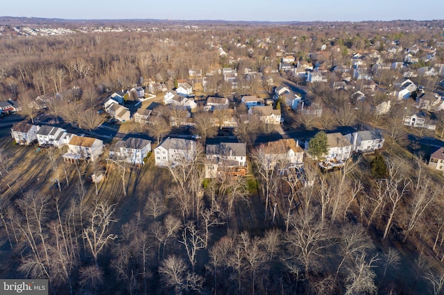 bird's eye view featuring a residential view and a view of trees