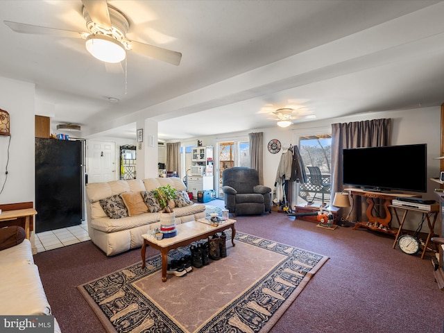 living room with carpet floors and ceiling fan