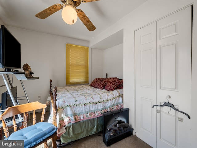 bedroom with carpet floors and a ceiling fan