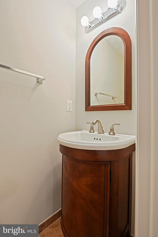 bathroom with baseboards