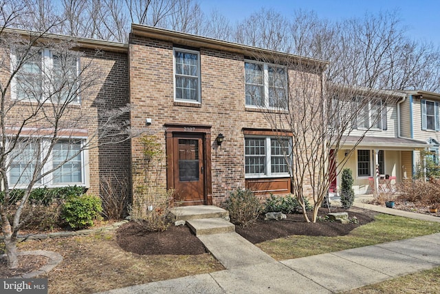 view of front of property with brick siding