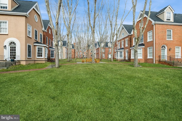 view of yard with a residential view