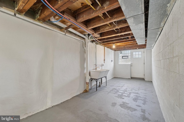 basement featuring a sink