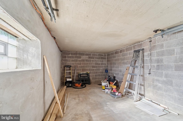 interior space featuring concrete block wall