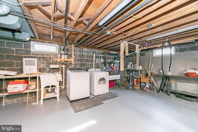 basement featuring separate washer and dryer