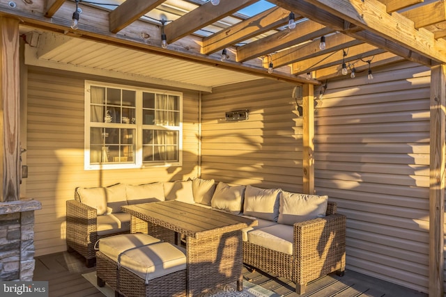 wooden terrace featuring an outdoor hangout area and a pergola