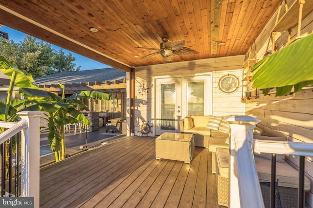 deck featuring french doors and outdoor lounge area