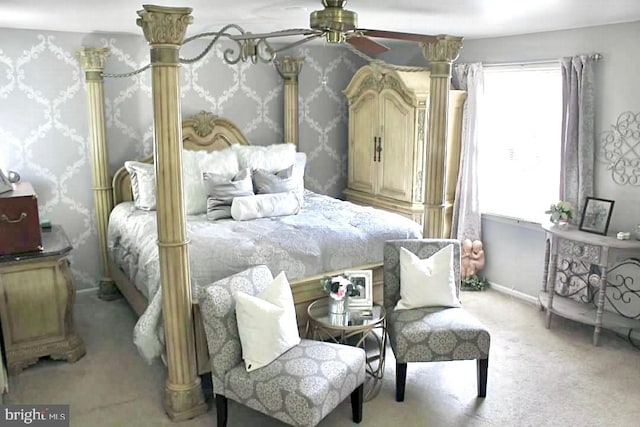 bedroom featuring carpet, a ceiling fan, and baseboards