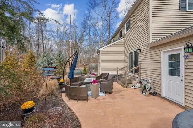 view of patio / terrace with entry steps and outdoor lounge area