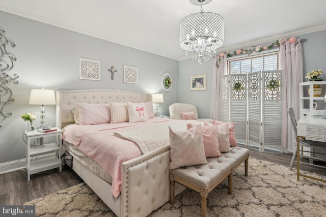 bedroom featuring access to exterior, a notable chandelier, ornamental molding, wood finished floors, and baseboards