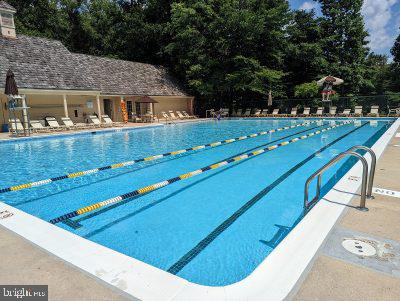 pool with a patio area