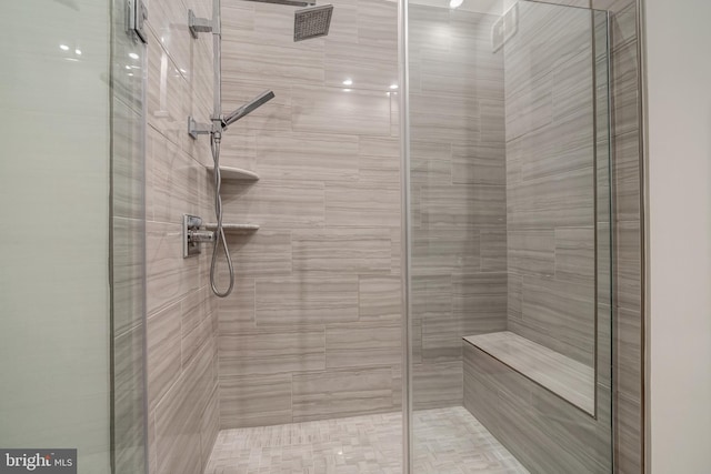 bathroom with a stall shower