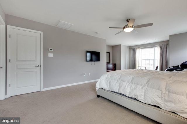 bedroom featuring carpet floors, visible vents, baseboards, and a ceiling fan