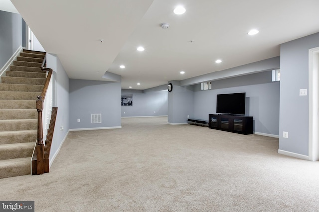 unfurnished living room featuring recessed lighting, visible vents, stairway, carpet flooring, and baseboards