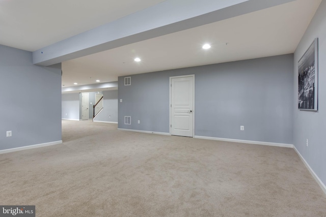 finished basement with recessed lighting, carpet flooring, stairway, and baseboards