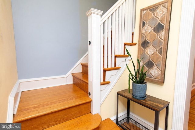 staircase with baseboards