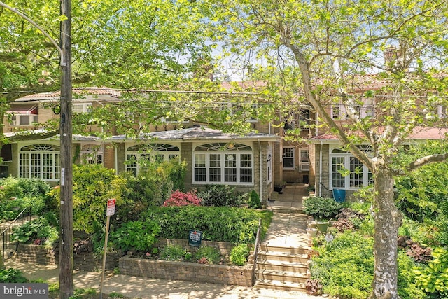 view of front of property with brick siding