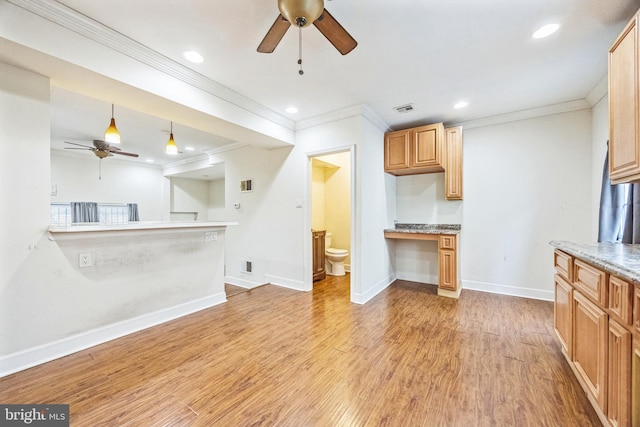 interior space with built in desk, recessed lighting, a ceiling fan, light wood-type flooring, and baseboards