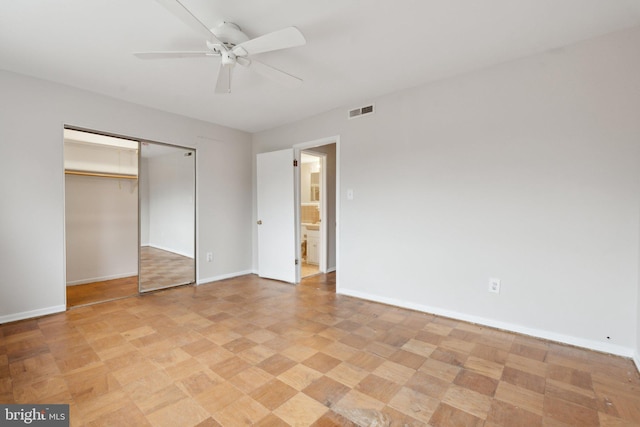 unfurnished bedroom with a ceiling fan, a closet, visible vents, and baseboards