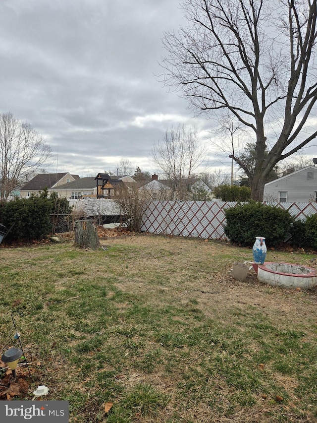 view of yard featuring fence