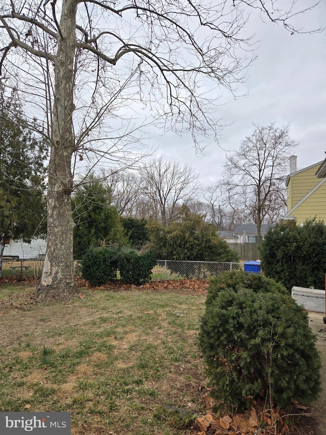 view of yard with fence