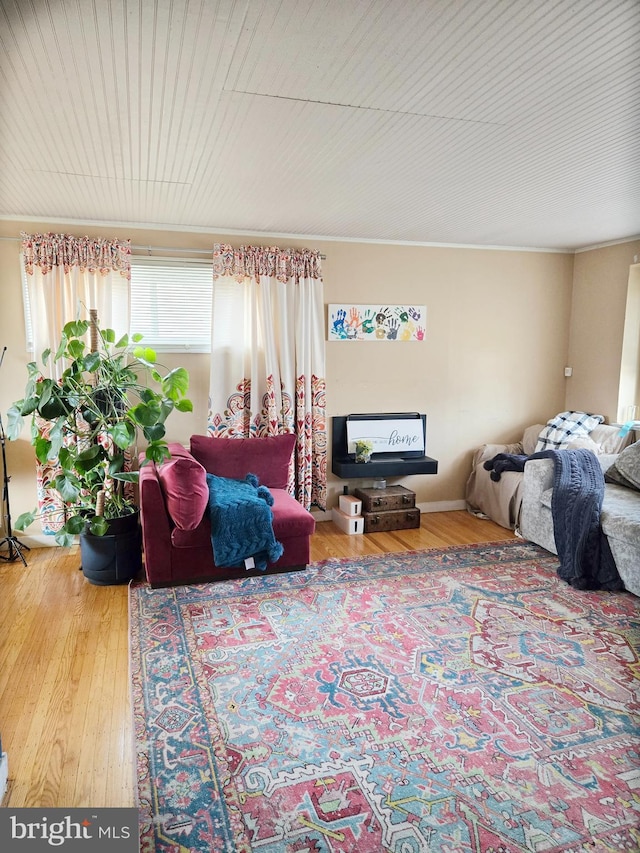 living area featuring hardwood / wood-style floors