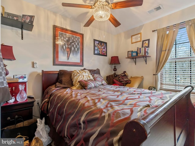 bedroom with visible vents and ceiling fan