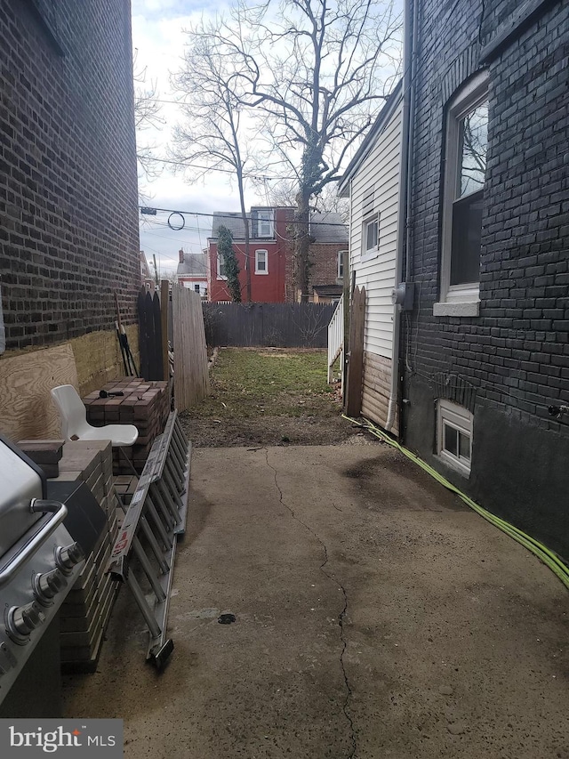 view of patio / terrace with fence