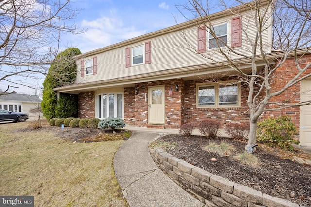 multi unit property featuring brick siding