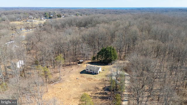 aerial view with a forest view and a rural view