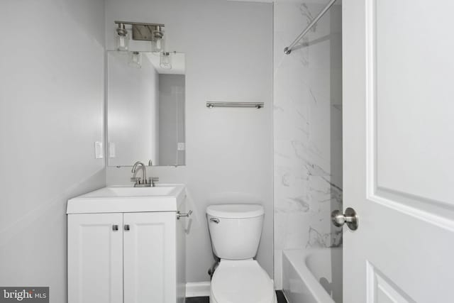 bathroom with toilet, shower / tub combination, and vanity