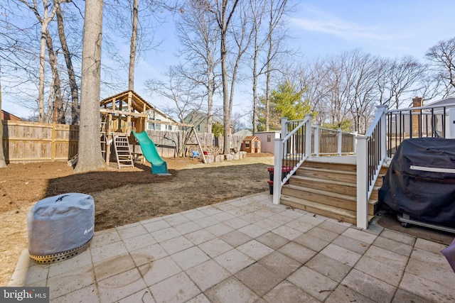 exterior space with a patio and a fenced backyard