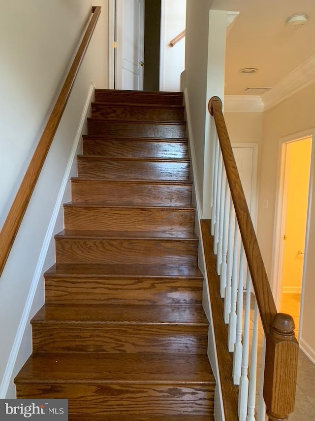 staircase with ornamental molding