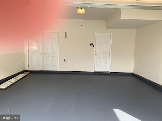 garage with baseboards