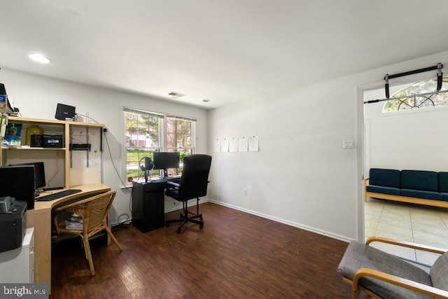 office with recessed lighting, wood finished floors, and baseboards