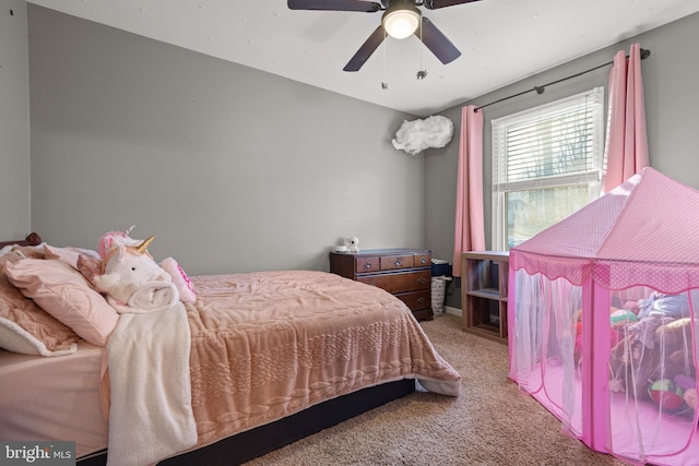 bedroom with ceiling fan and carpet