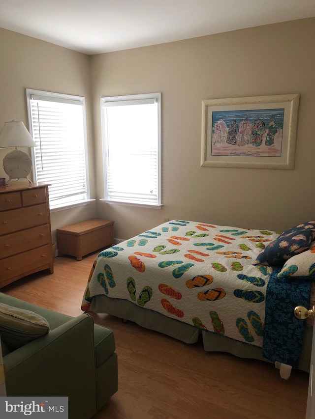 bedroom featuring light wood-type flooring