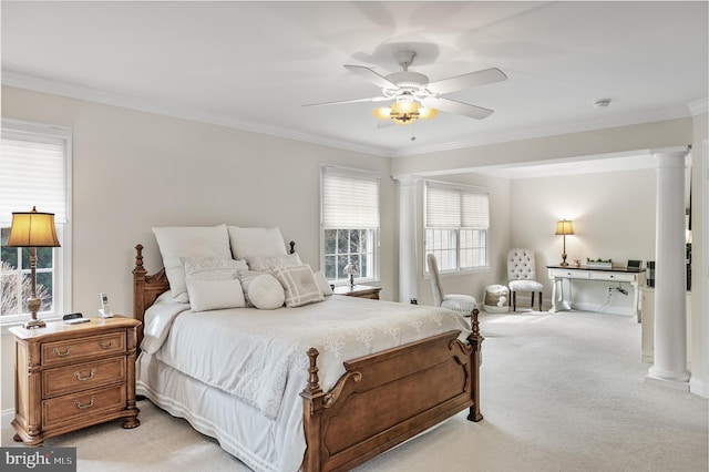 bedroom with ornamental molding, light carpet, decorative columns, and baseboards