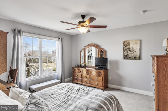 bedroom featuring carpet, ceiling fan, and baseboards