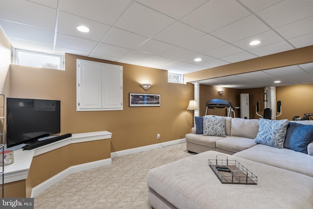 carpeted living area featuring recessed lighting, a drop ceiling, and baseboards