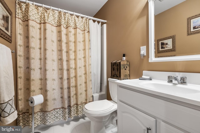 full bathroom with shower / bath combination with curtain, tile patterned flooring, vanity, and toilet