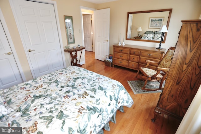 bedroom with wood finished floors