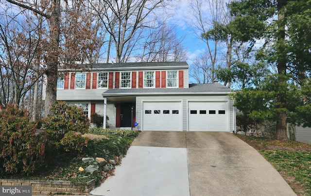 view of front of house with driveway and an attached garage