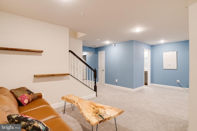 living room with carpet, recessed lighting, baseboards, and stairs