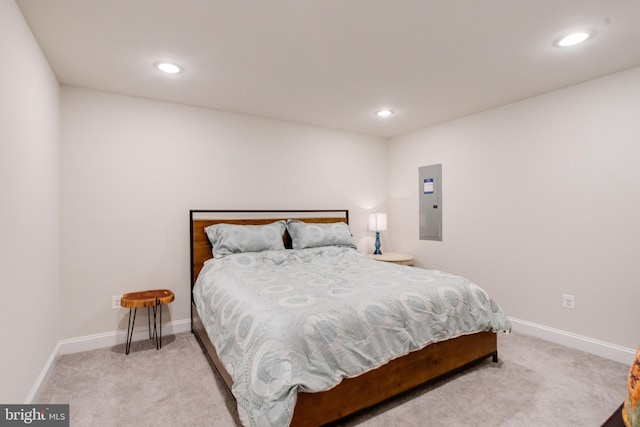 bedroom with light carpet, baseboards, and recessed lighting